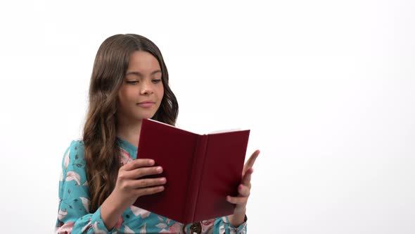 Smiling Child Reader with Educational Book with Amazed Face Isolated on White Knowledge