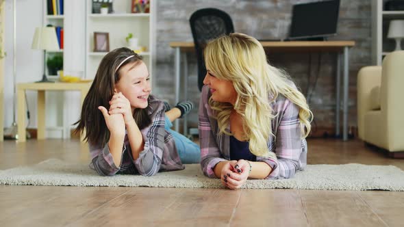 Little Girl with Braces Lying on the Floor