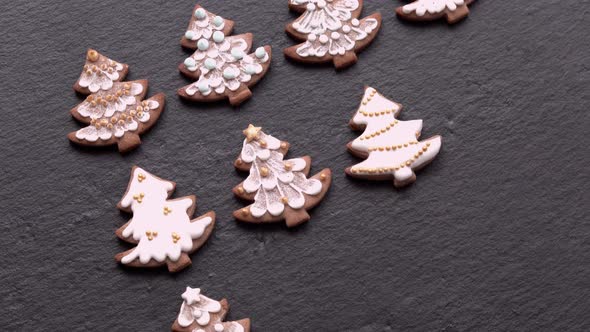 Handlaid Gingerbread Cookies Christmas Trees on Slate Table