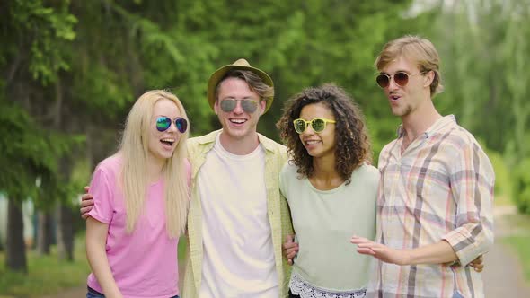 Young Cheerful Couples Talking and Laughing, Remembering Good Funny Moments