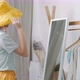 Lovely Asian girl trying the new hat in front of the mirror. - VideoHive Item for Sale