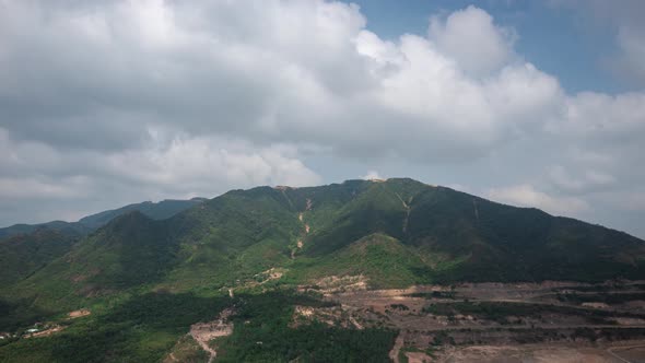 Drone view time lapse hyper lapse of clouds flying through the mountain peak, Khanh Hoa province, ce