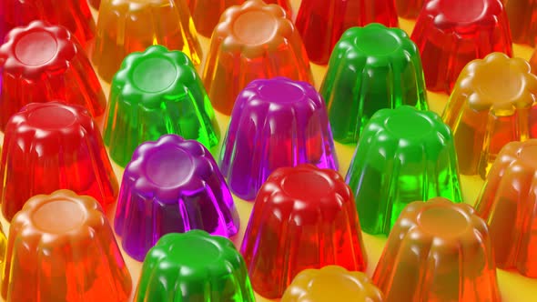 Seamless animation of multiple colorful jellies shaking. Tasty Jello desserts.