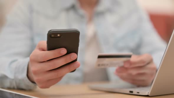 Online Shopping on Smartphone By Male Hands Close Up