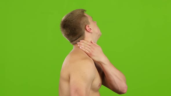 Man Suffers From Pain in Neck, Side View, Green Screen