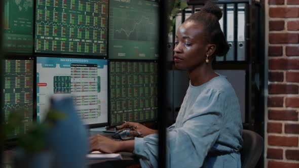 Financial Analyst Taking Notes on Clipboard to Work on Stock Trade