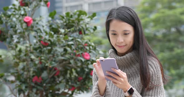 Woman use of smart phone at outdoor