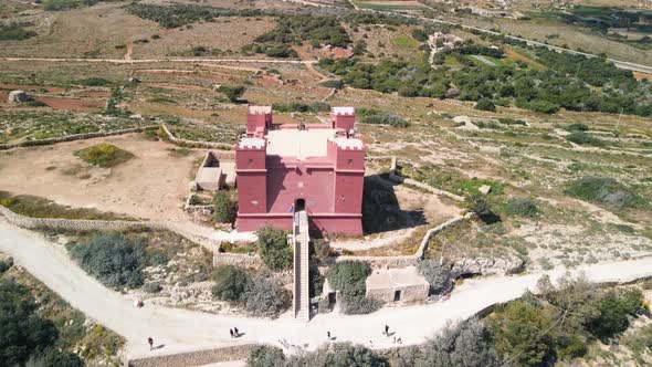 Aerial view of St Agatha's Tower (Red tower). Mellieha city. Landscape on Malta island with the sea