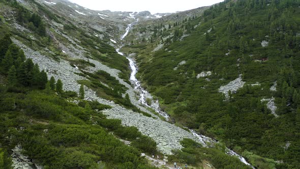 Aerial View of Mountain Landscape with Spring Waterfall Near Olpererhutte Zillertal Tirol Austria