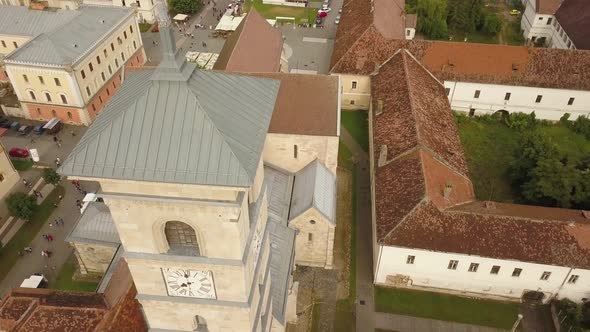 Aerial Shot moving Backwards past cross (close up) above a christian orthodox church in Citadel Alba