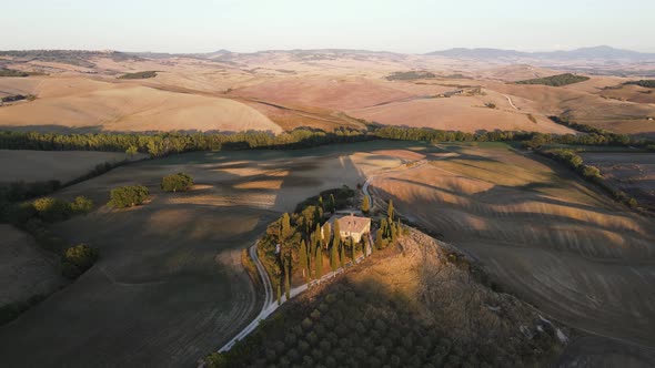 Aerial view of Val d'Orcia countryside landscape in Tuscany, Italy.