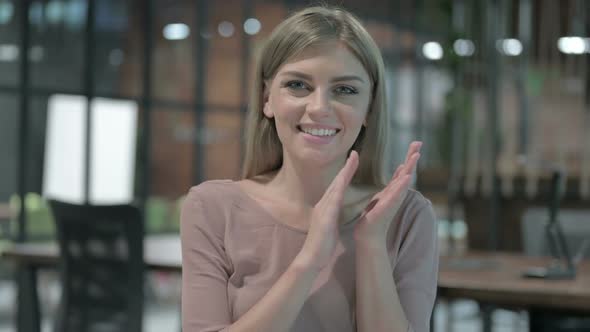 Portrait Shoot of Happy Woman Clapping with Hands