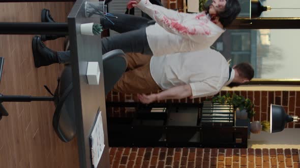 Vertical Video Walking Dead Office Workers with Bloody Scars Wandering in Workspace