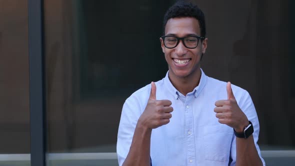 Gesture of Satisfaction, Thumbs Up by Young Black Handsome Man