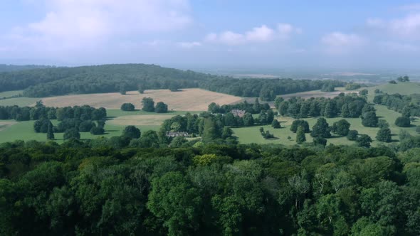 Aerial landscape shot of beautiful rolling hills in English countryside