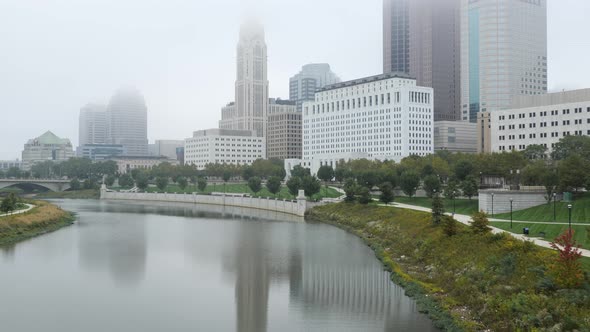 Kayaking in downtown Columbus, Ohio on the Scioto River on a foggy day.