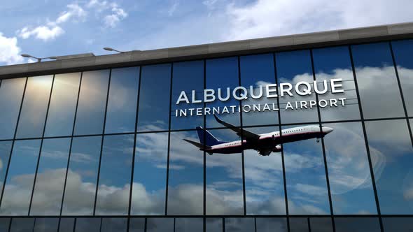 Airplane landing at Albuquerque USA, New Mexico airport mirrored in terminal