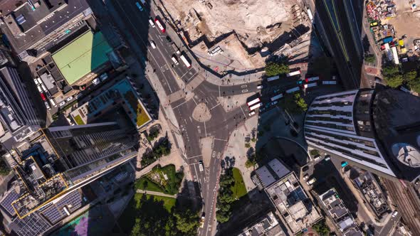 Aerial Birds Eye Overhead Top Down Descending Hyperlapse Footage of Traffic on Road Intersection