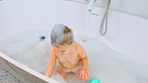 The Child Takes a Bath