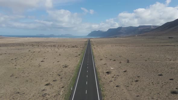 Aerial view of a road across the desert, Canary Islands, Spain.