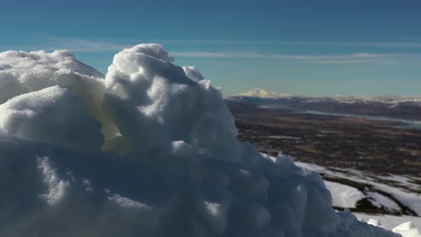 Snow slide and focus to mountain view 