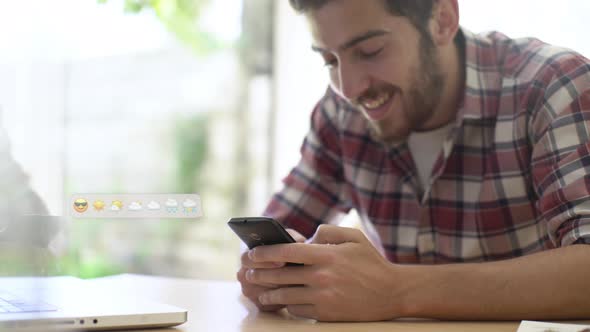 Young man chatting on smartphone