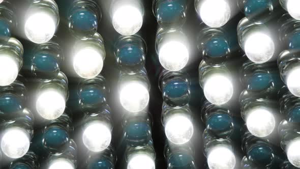 Spotlights brightly shine close-up 4 K alt