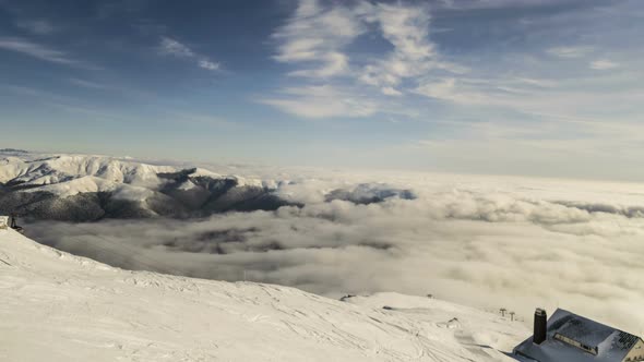 Peaks Of Mountains Above The Clouds