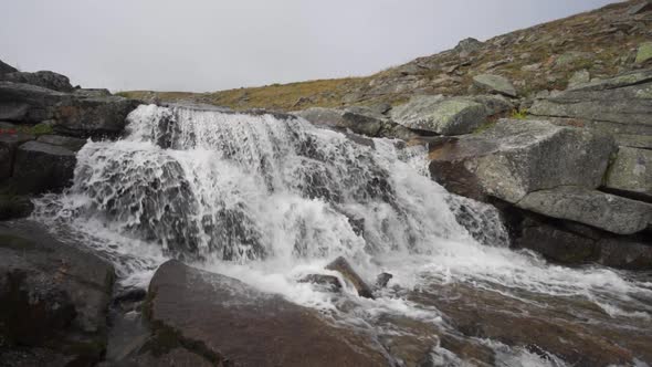 A Stormy Mountain River Flows Among the Stones