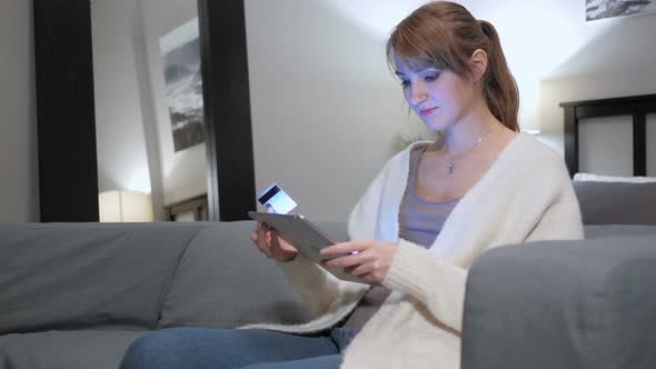 Online Shopping on Tablet PC By Sitting Woman