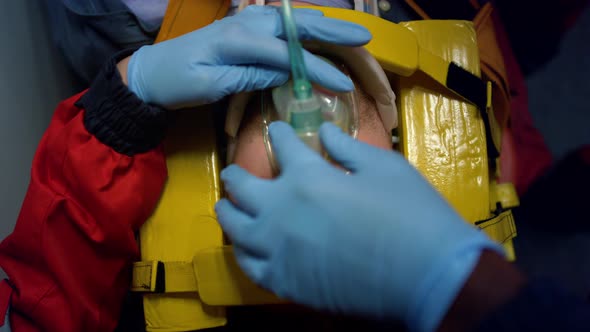 Paramedics Proving First Aid Help to Man