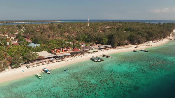 Drone Rising From Resort Over Sea Of Gili Inlands