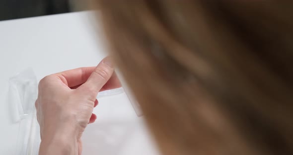 Person holding rapid antigen self test with negative result of Covid-19