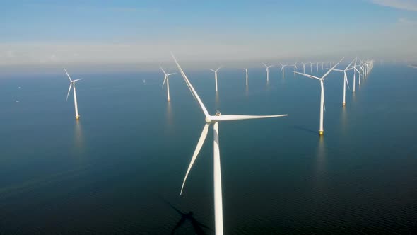 Windmill Park in the Ocean Drone Aerial View of Windmill Turbines Generating Green Energy Electric