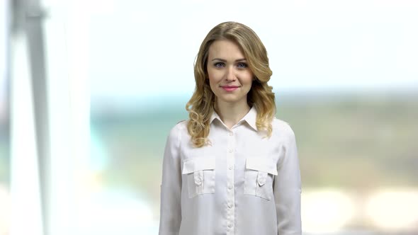 Young Beautiful Business Woman Looking at Camera