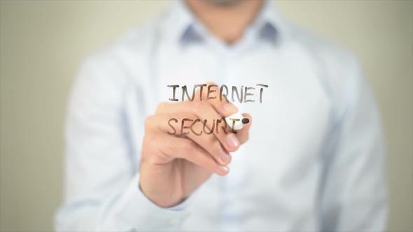 Internet Security Man Writing on Transparent Screen