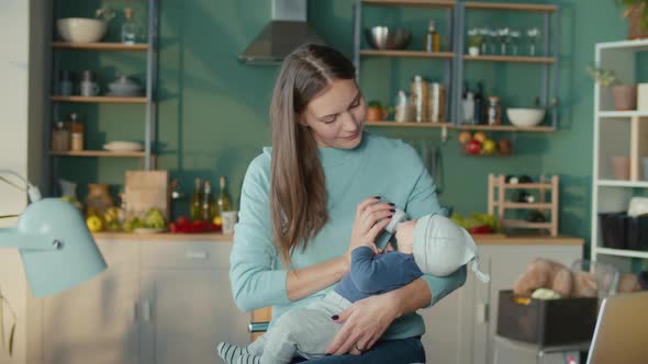 Mother Feeding Her Baby