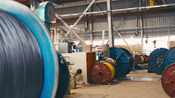 Spinning Reel with Cable in Cable Production Plant Closeup