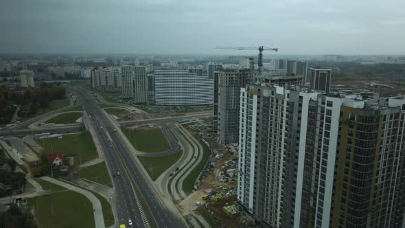 Construction of modern multi-storey buildings. Construction of a new city block.