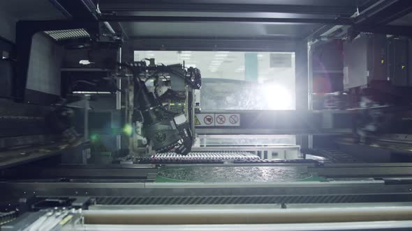 Surface Mount Technology SMT Machine places components on a circuit board