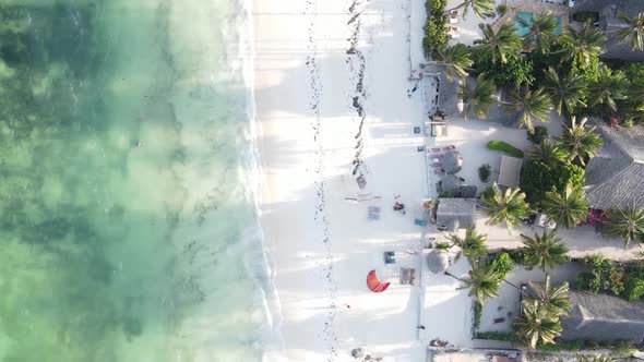 Vertical Video of the Ocean Near the Coast of Zanzibar Tanzania Aerial View