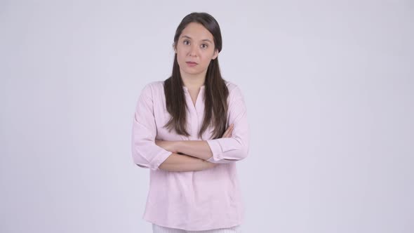 Young Beautiful Multi-ethnic Businesswoman with Arms Crossed