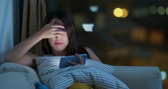 Woman use cellphone for online shopping at night