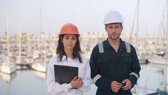 Seafarers Man and Woman Working Together in Yacht Club