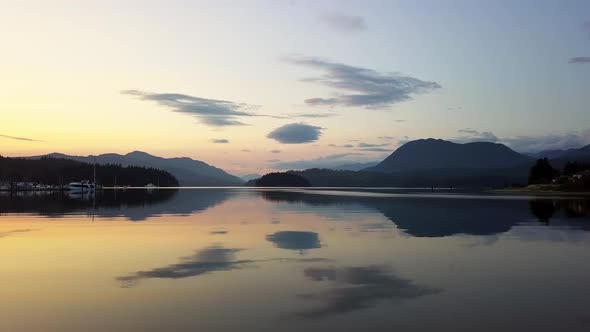 Aerial View Of Sunset Reflecting In The Tranquil Waters Of Sechelt Inlet In British Columbia, Canada