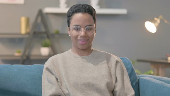 Portrait of African Woman Shaking Head As Yes Sign