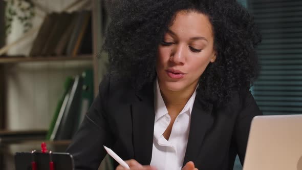 Portrait of African American Woman Talks on Video Call Using Smartphone