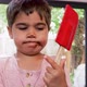 Boy licking chocolate cream from spatula - VideoHive Item for Sale
