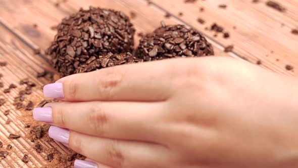 Woman Hand Pick Up Brigadeiro Brazilian Chocolate Dessert