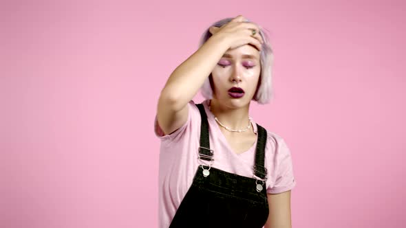 Girl with Violet Hairstyle Is Tired, Bored of Work or Studying, She Disappointed, Helpless